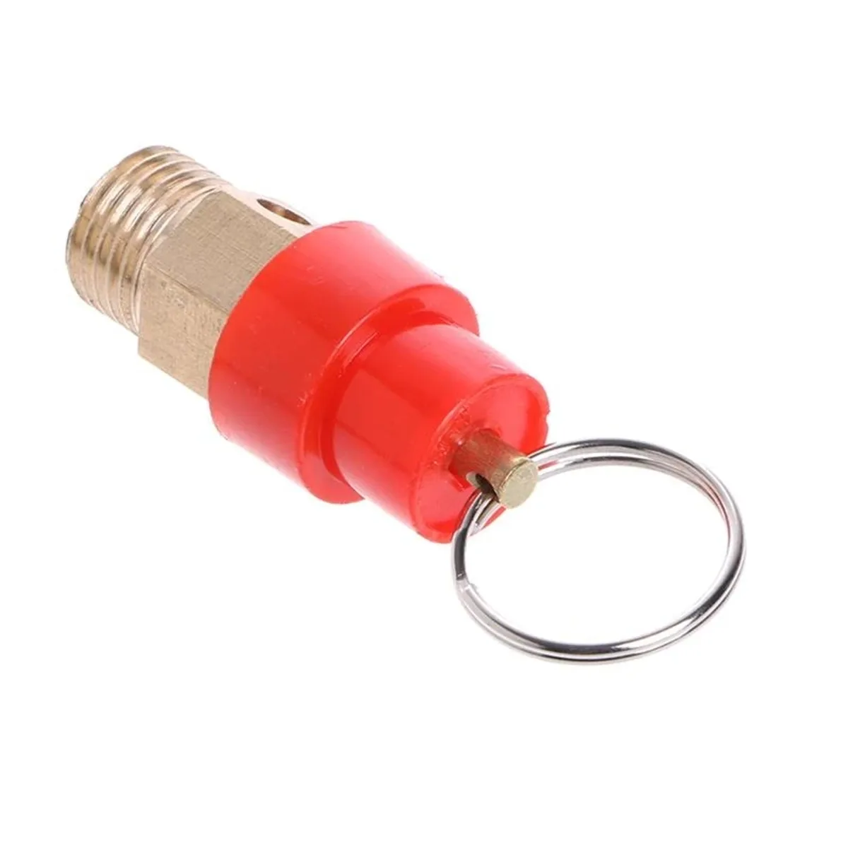 Brass compressor safety valve with a red plastic cap and a metal split ring pull on a plain background