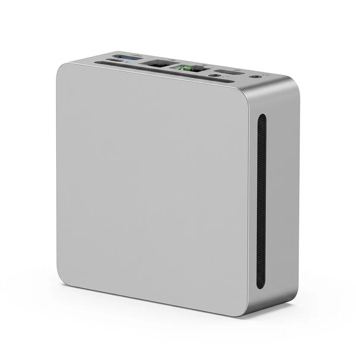 Silver Ryzen Mini PC angled view showing top I/O ports and side ventilation vent.